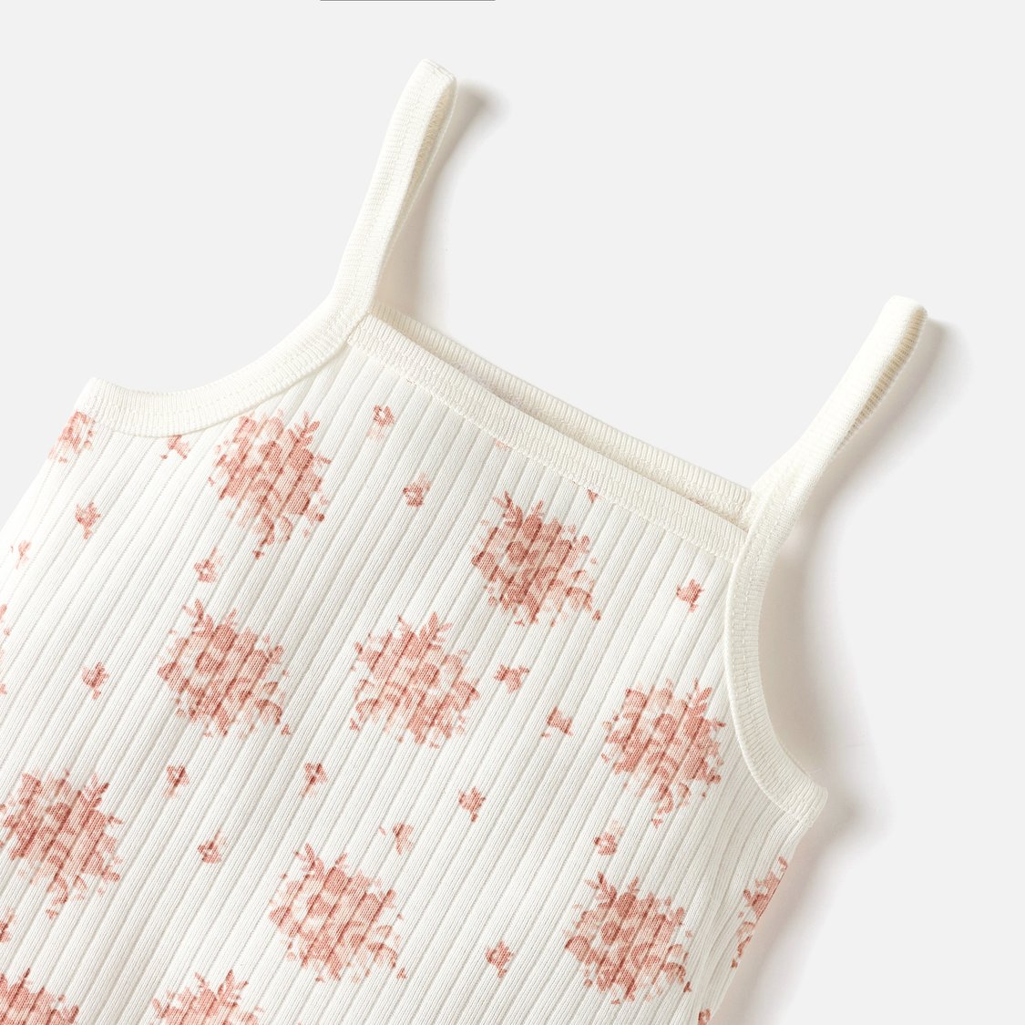 Juniors All-Over Floral Print Sleeveless Bodysuit with Snap Button Closure
