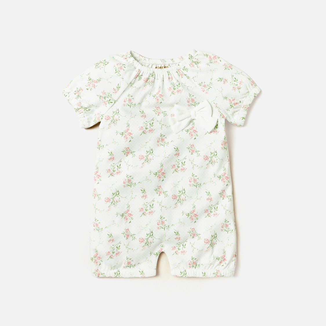 Giggles All-Over Floral Print Romper with Bow Detail