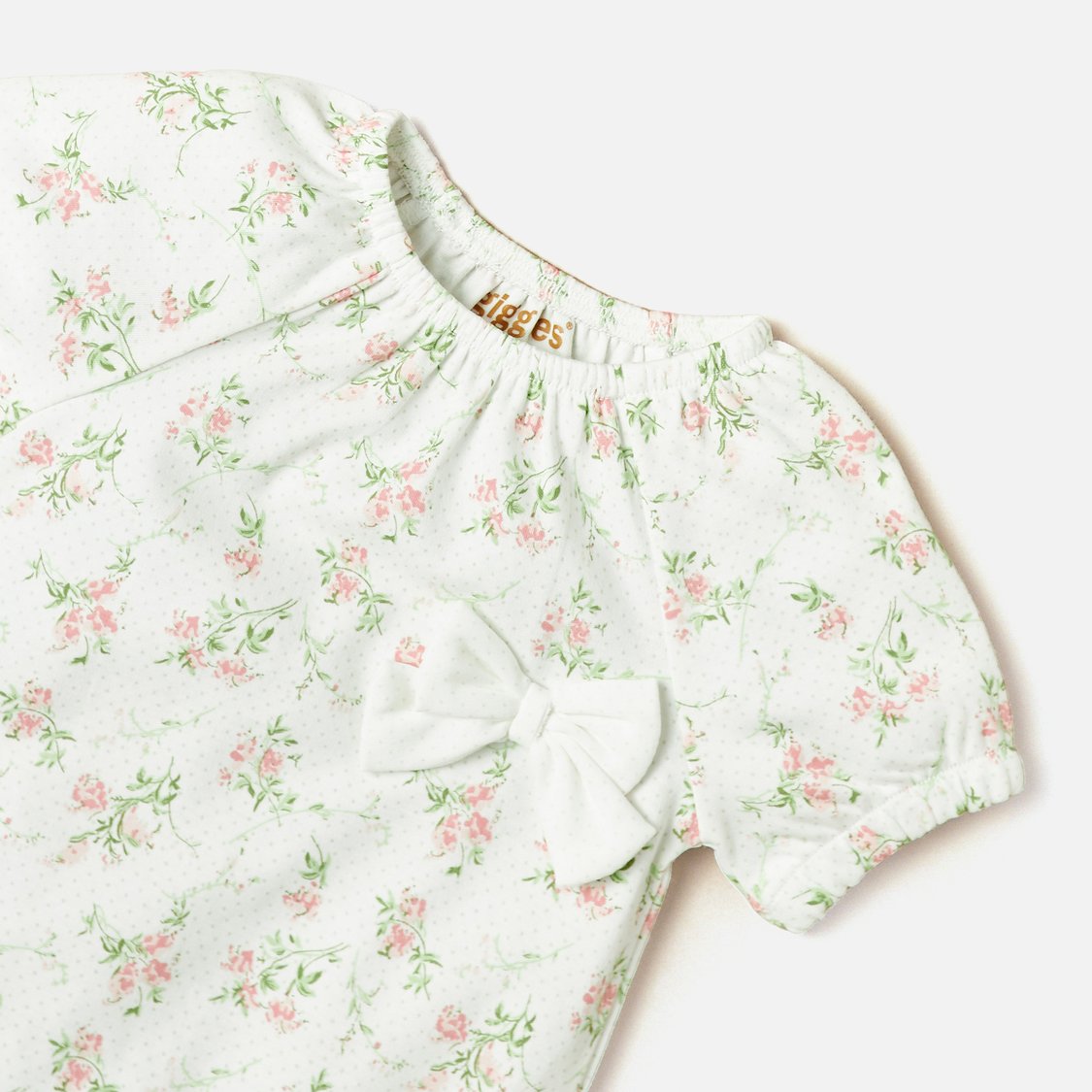 Giggles All-Over Floral Print Romper with Bow Detail