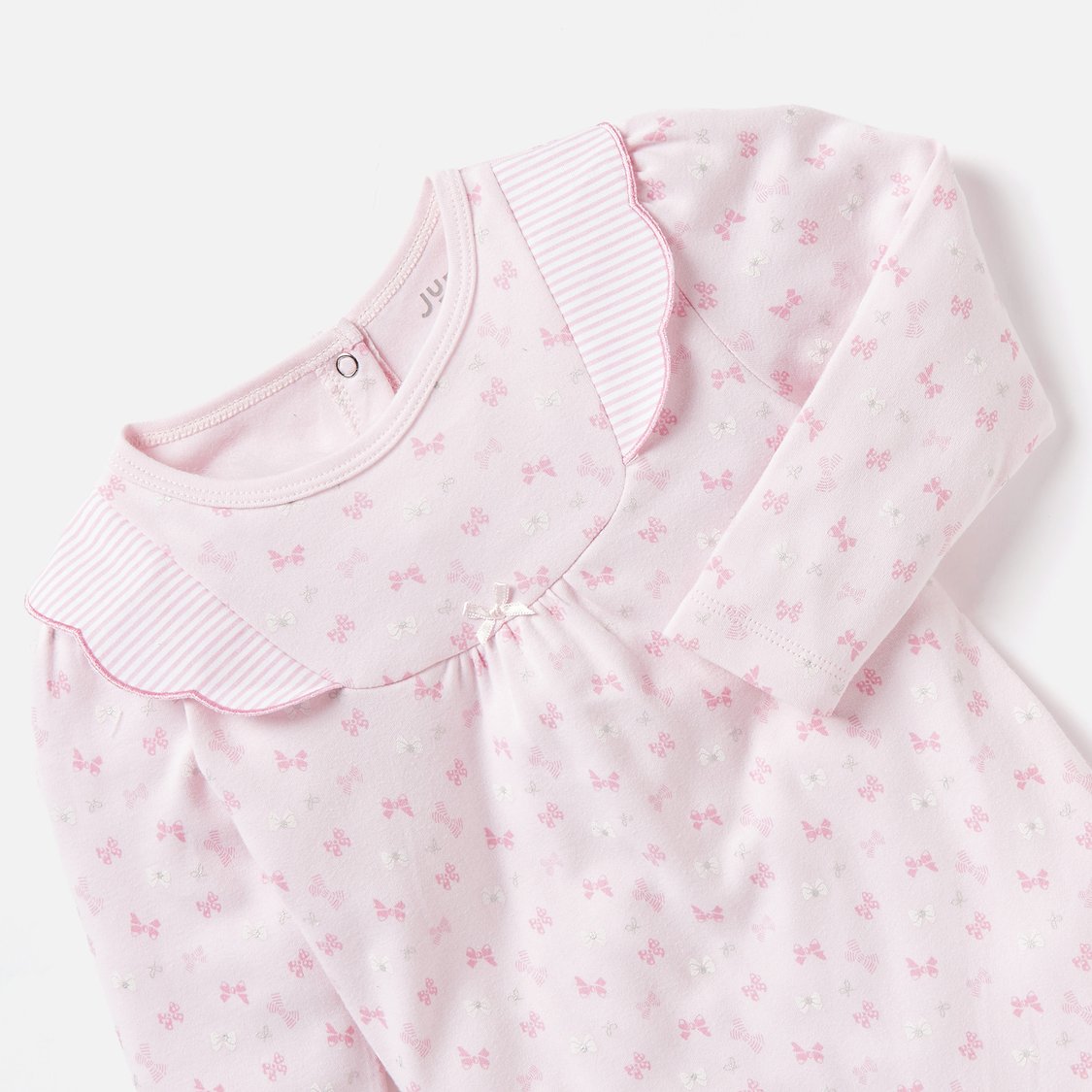 Juniors Bow Print Closed Feet Sleepsuit with Button Closure and Ruffle Detail