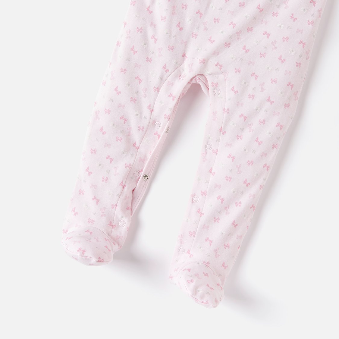 Juniors Bow Print Closed Feet Sleepsuit with Button Closure and Ruffle Detail