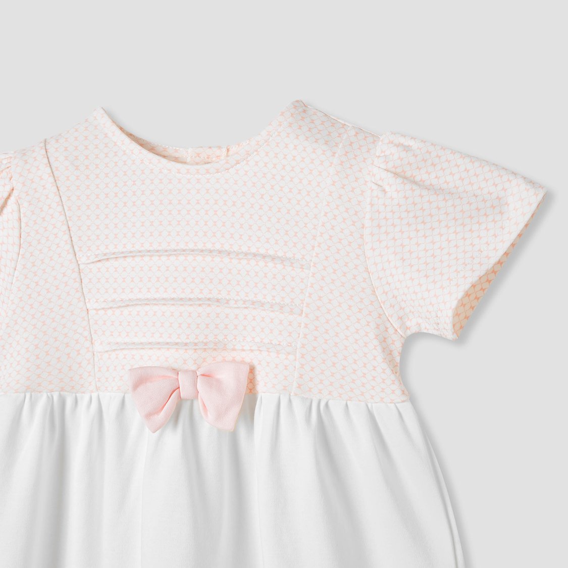 Giggles Printed A-line Dress with Bow Applique