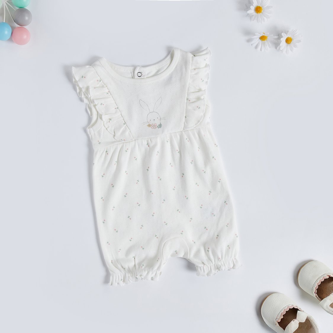 Juniors Floral Textured Romper with Button Closure