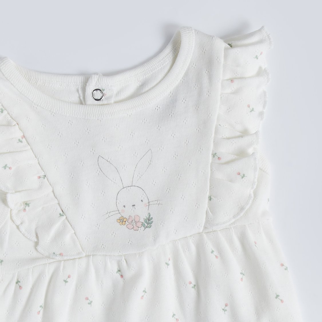 Juniors Floral Textured Romper with Button Closure