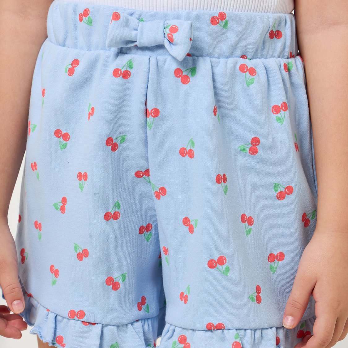 Juniors Cherry Print Shorts with Ruffle Hem