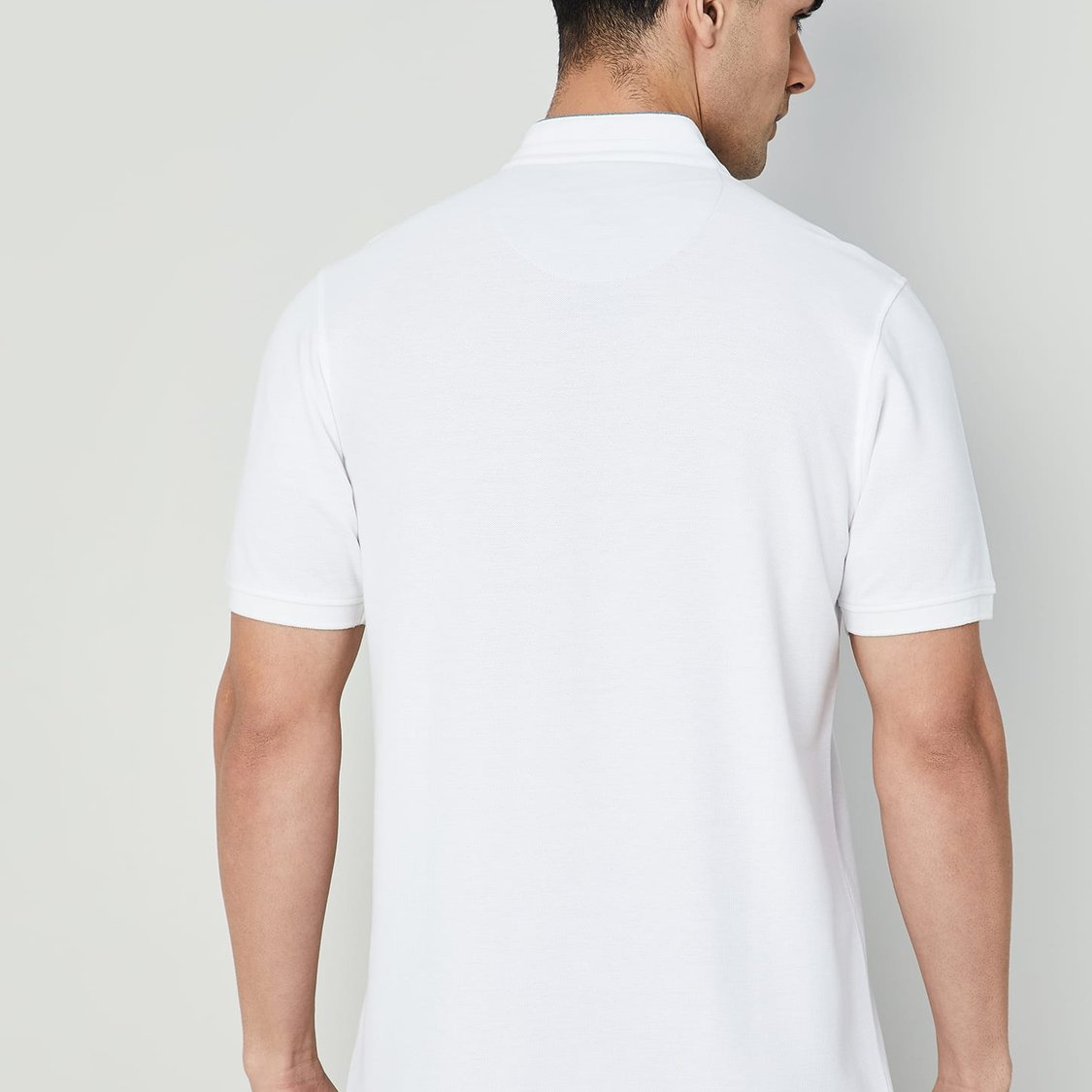 Buy CODE Solid Polo T-shirt from CODE at just INR 999.0