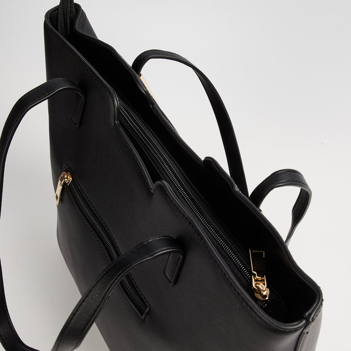 Buy CODE Solid Shoulder Bag from CODE at just INR 1699.0