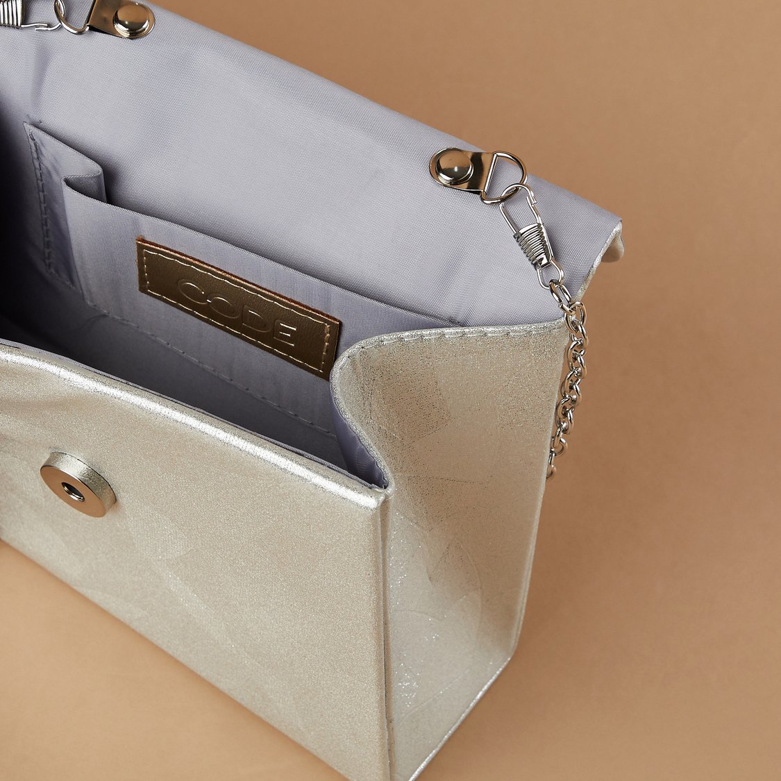 CODE Patterned Foldover Clutch