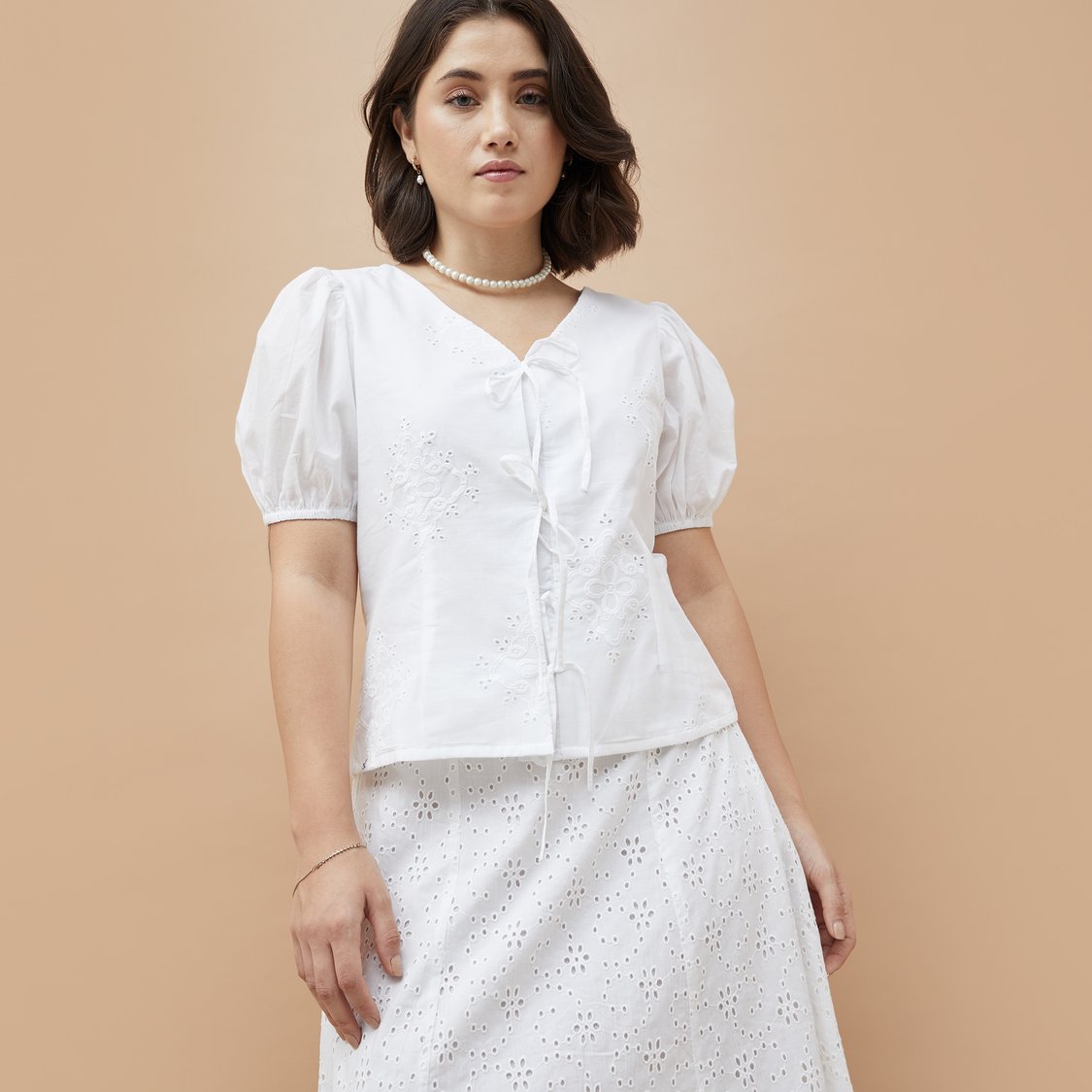 Off White Cotton Schiffli Front Neck Dori Knot Top