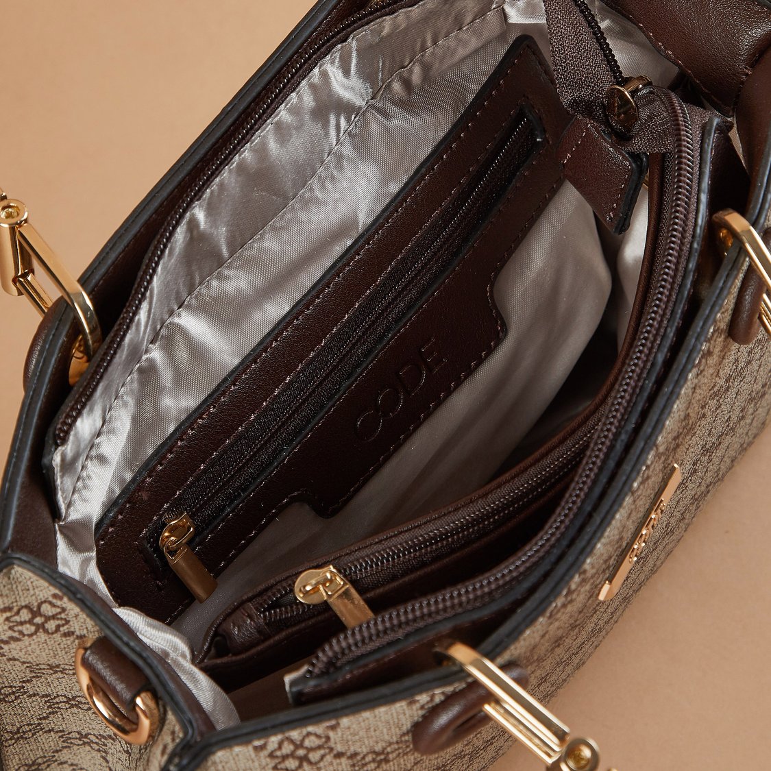 Buy CODE Printed Handheld Bag from CODE at just INR 2499.0