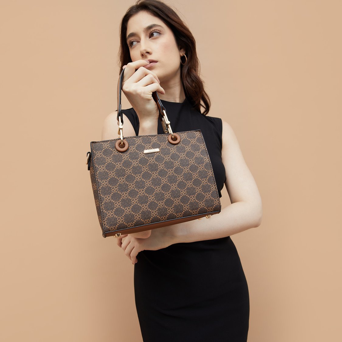 Buy CODE Printed Handheld Bag from CODE at just INR 2499.0