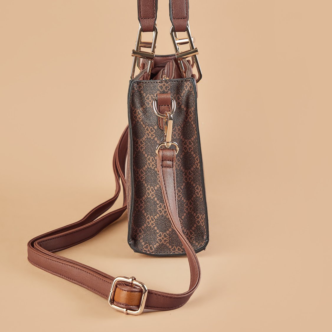 Buy CODE Printed Handheld Bag from CODE at just INR 2499.0