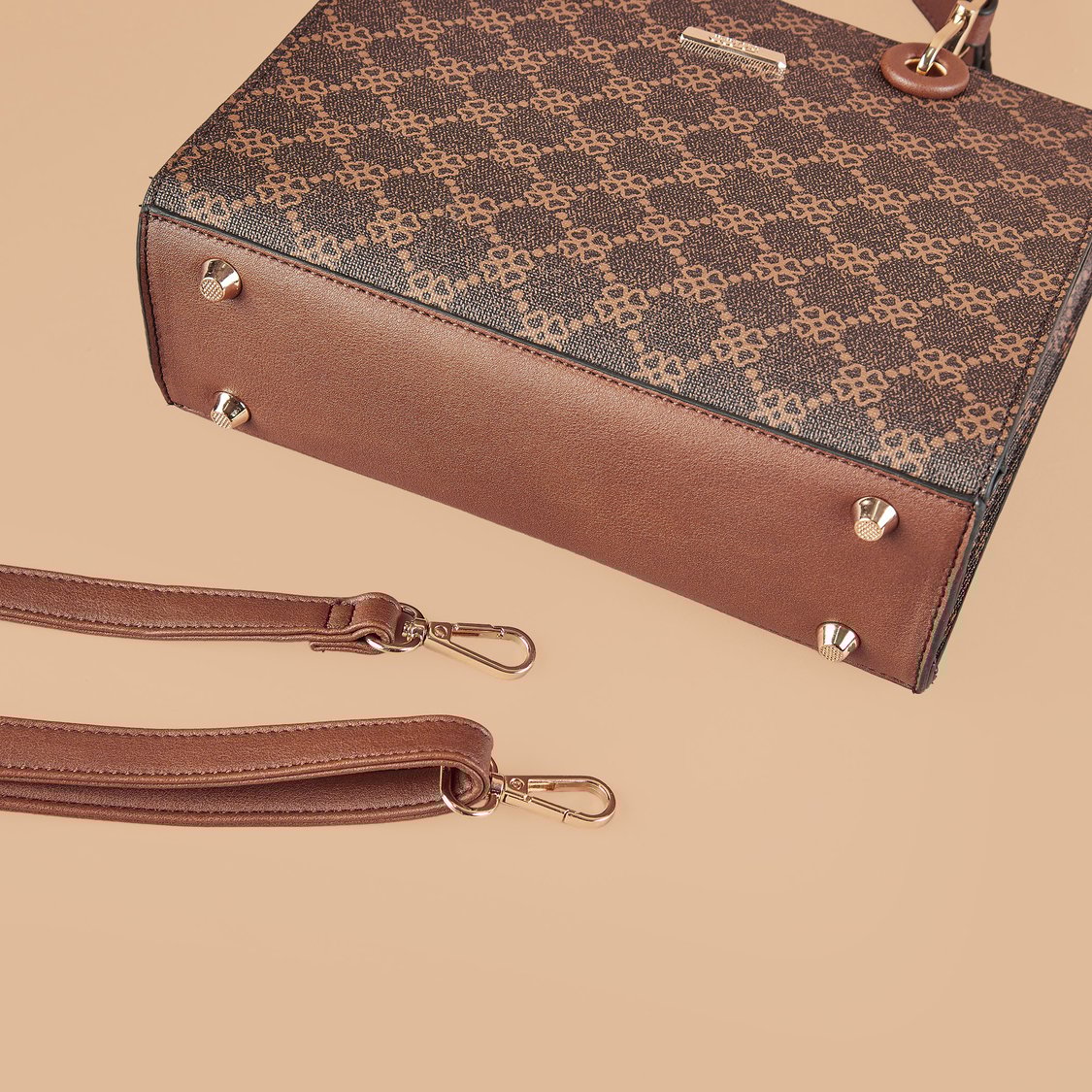 Buy CODE Printed Handheld Bag from CODE at just INR 2499.0