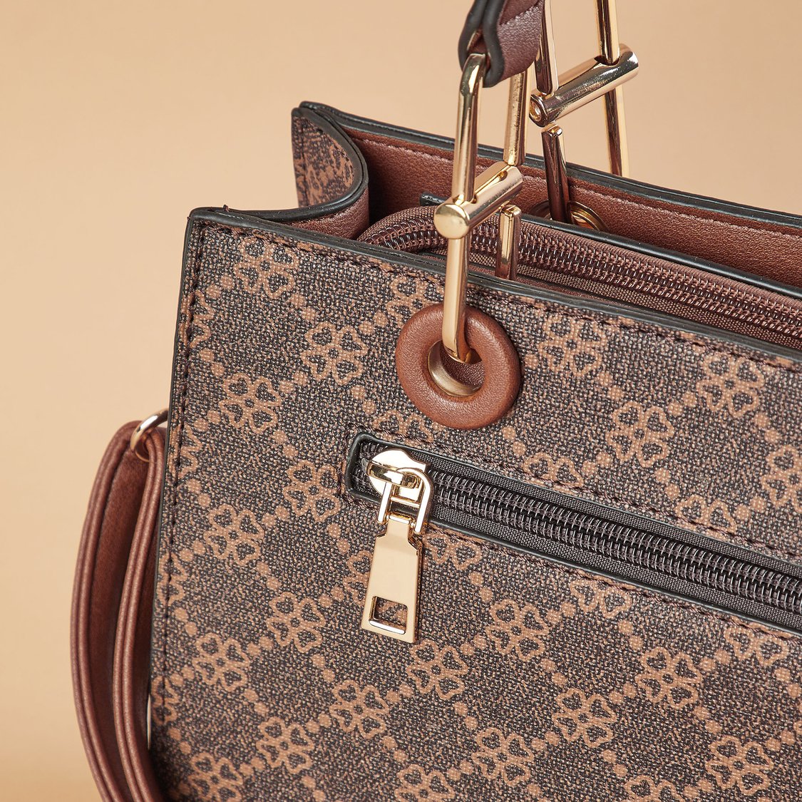 Buy CODE Printed Handheld Bag from CODE at just INR 2499.0