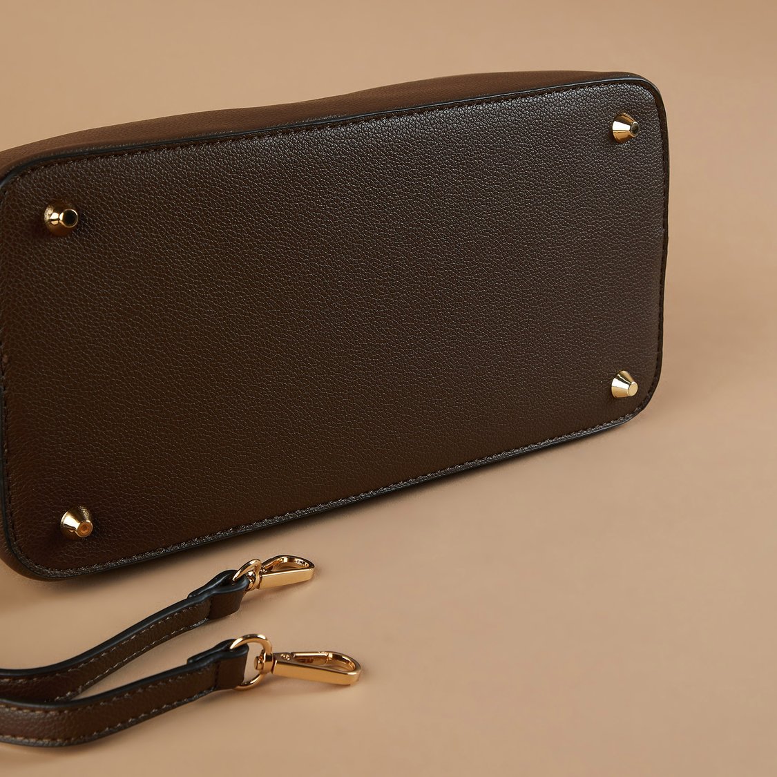 Buy CODE Textured Handheld Bag with Teddy Charm from CODE at just INR ...