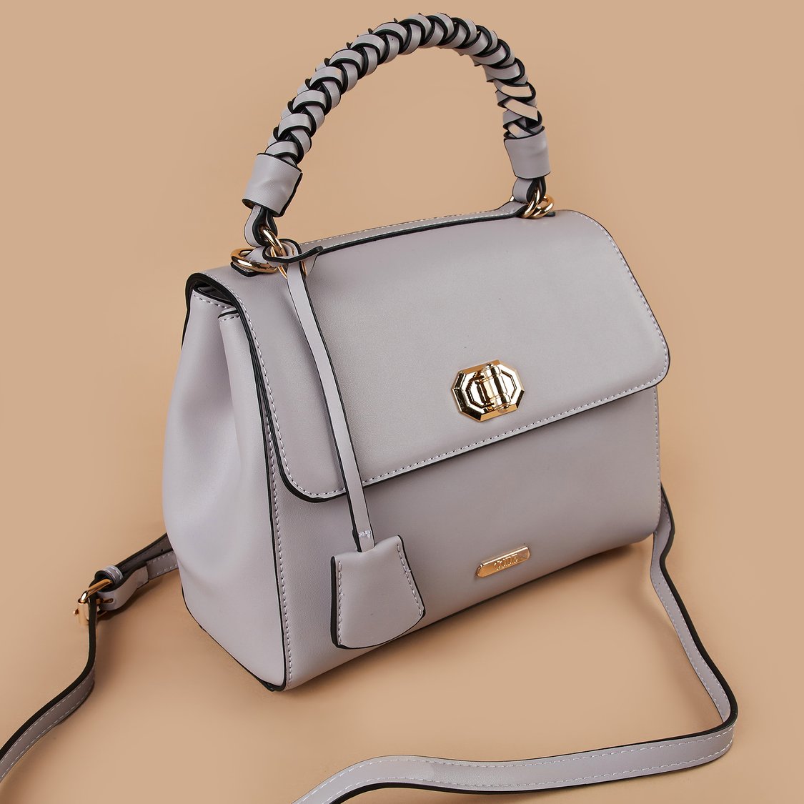 Buy CODE Solid Handheld Bag from CODE at just INR 2299.0