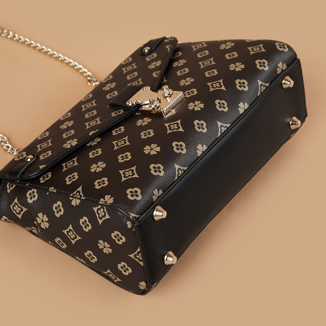 Buy CODE Monogram Print Sling Bag from CODE at just INR 2299.0