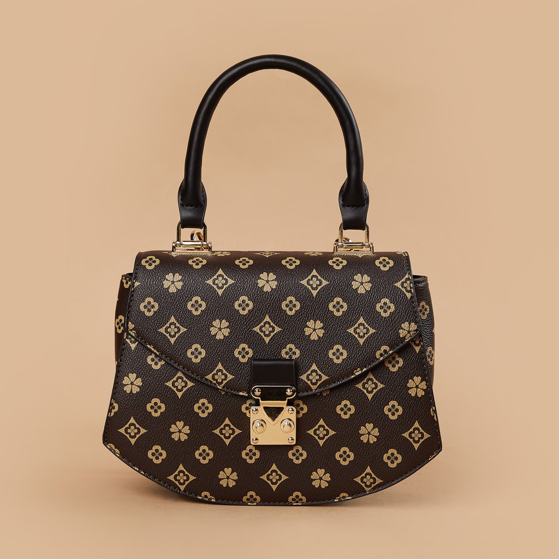 Buy CODE Monogram Print Handheld Bag from CODE at just INR 1999.0