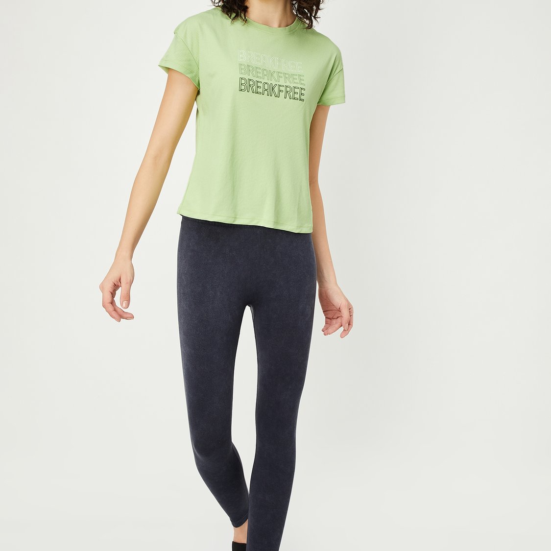 Buy Women Solid Sports T-shirt Online at just Rs. 499.0