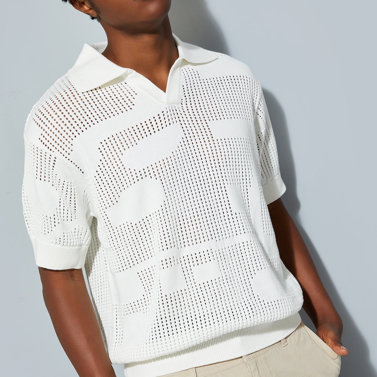 トップス MESH POLO COCONUT MILK L ₹849 | Campus Sutra Men's Onyx Black Marquise-Panel Jacquard Polo