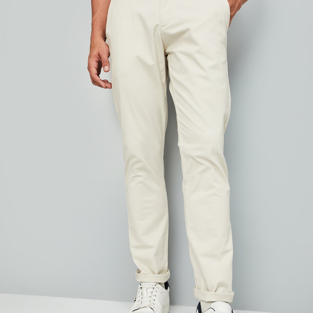 Buy Men Slim Fit Solid Flexi Waist Chinos Online at just Rs