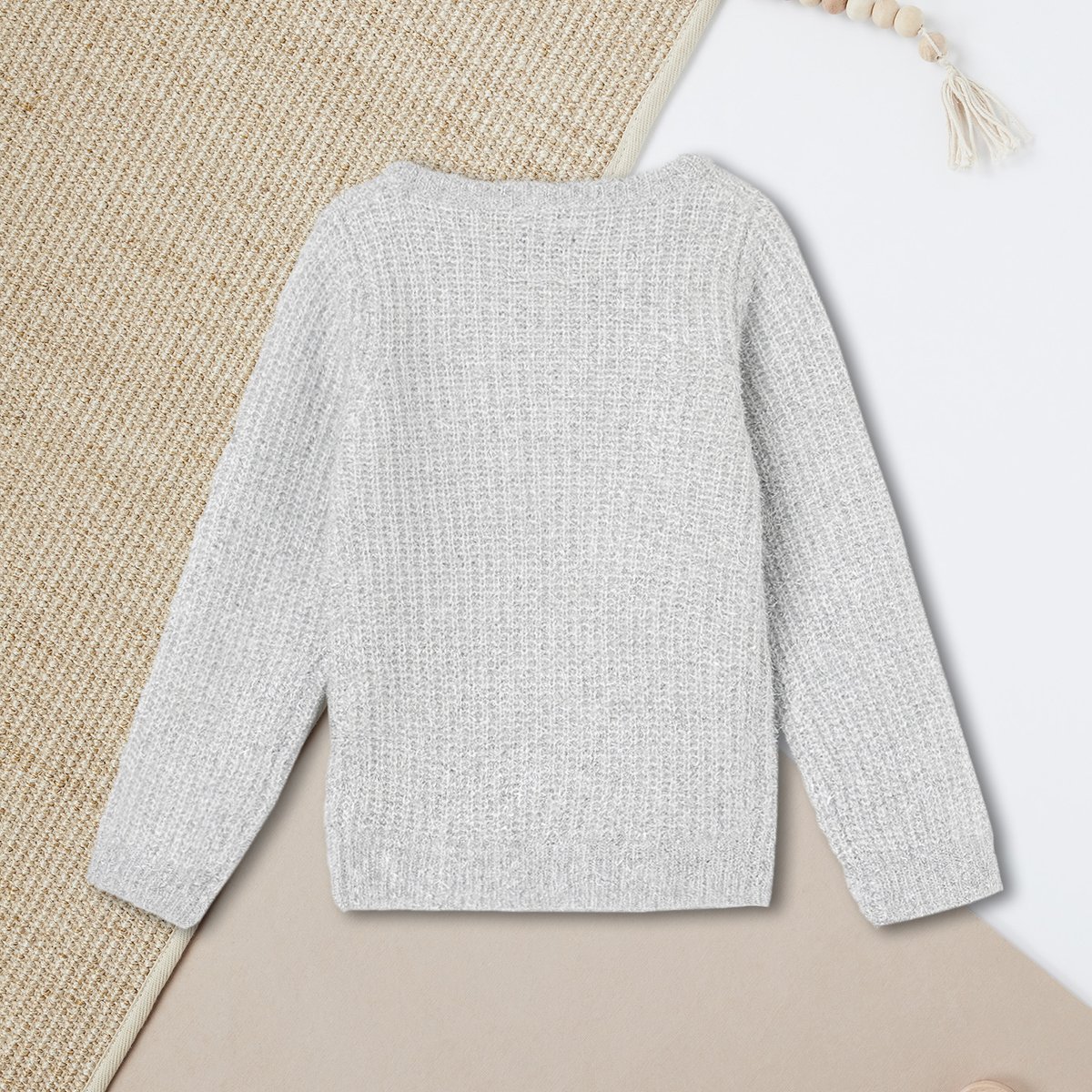 Buy Girls Metallic Knit Sweater Online at just Rs. 899.0