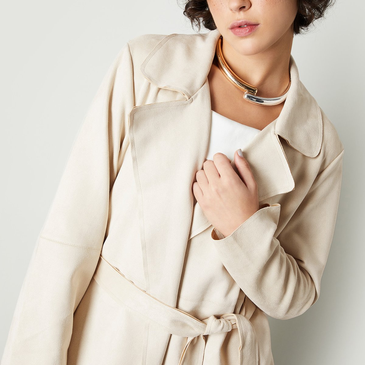 Buy Women Solid Belted Trench Coat Online at just Rs. 2299.0