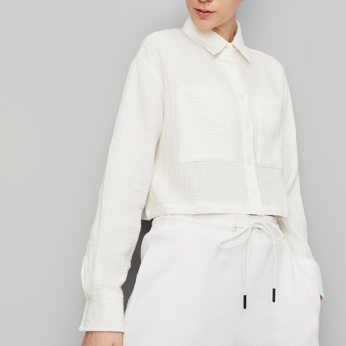 Buy Women Crinkled Cropped Shirt Online at just Rs. 899.0