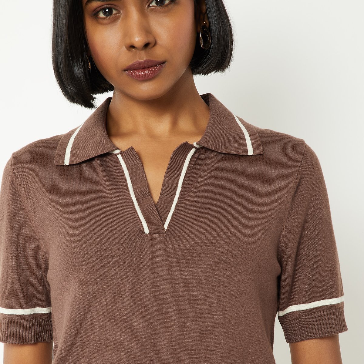 Buy Women Knit Polo T-shirts Online at just Rs. 899.0