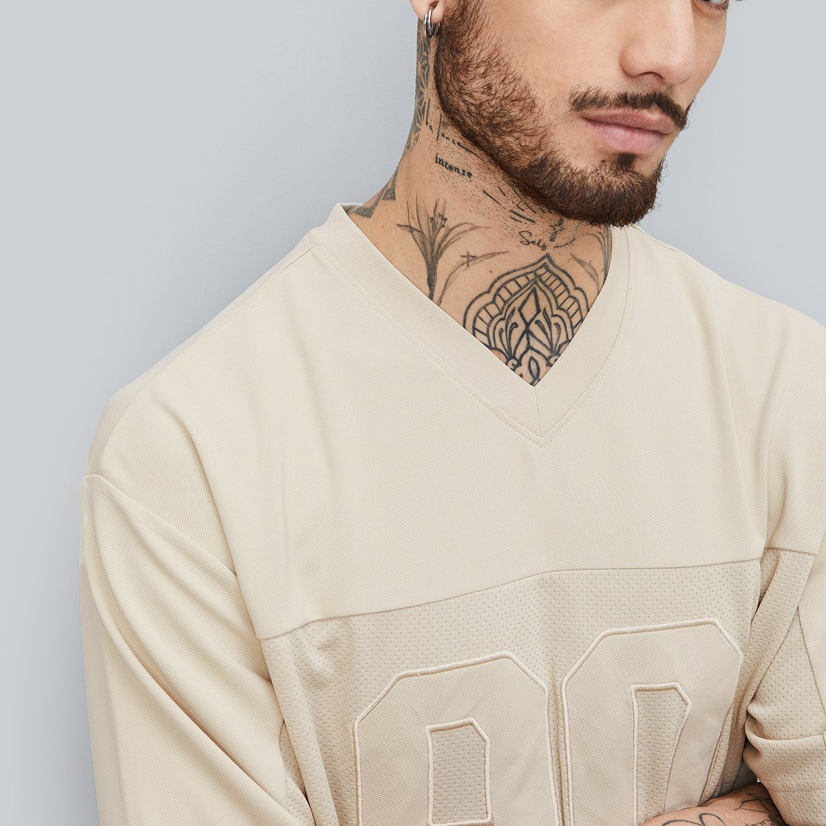 Buy Men Textured Oversized Sports T-shirt Online at just Rs. 599.0