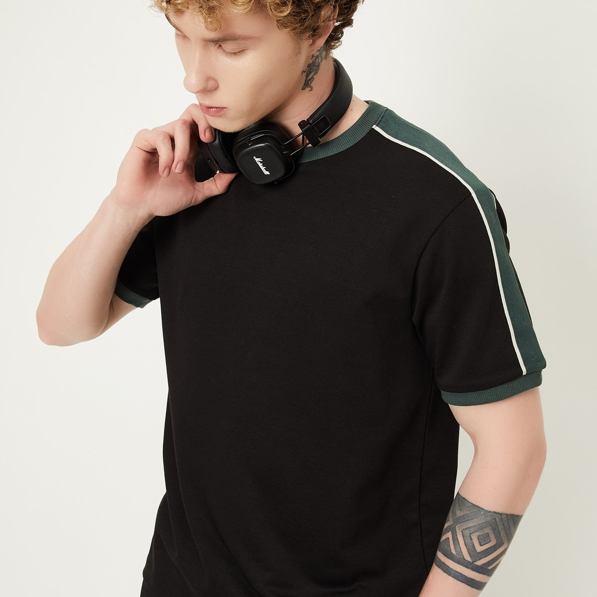 Buy Men Solid Side Taped T-shirt Online at just Rs. 699.0