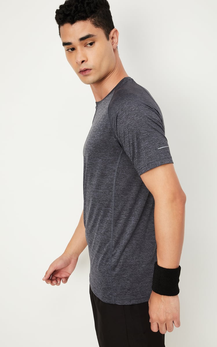 Buy Men Solid Sports T-shirt Online at just Rs. 399.0 