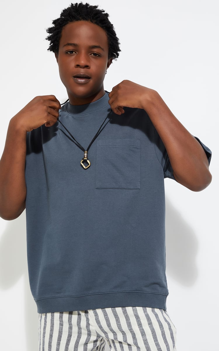 Buy URB_N Men Oversized Solid T-shirt Online at just Rs. 699.0