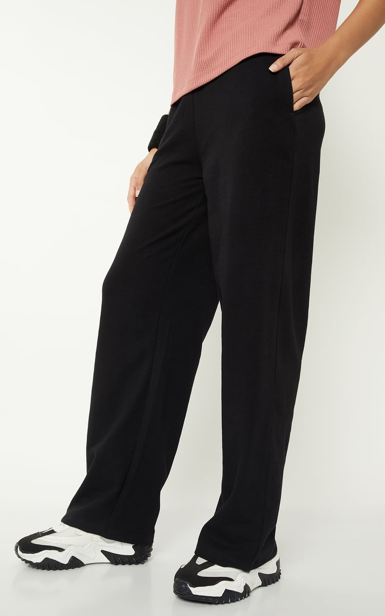 Buy Women Solid Athleisure Track Pants Online at just Rs