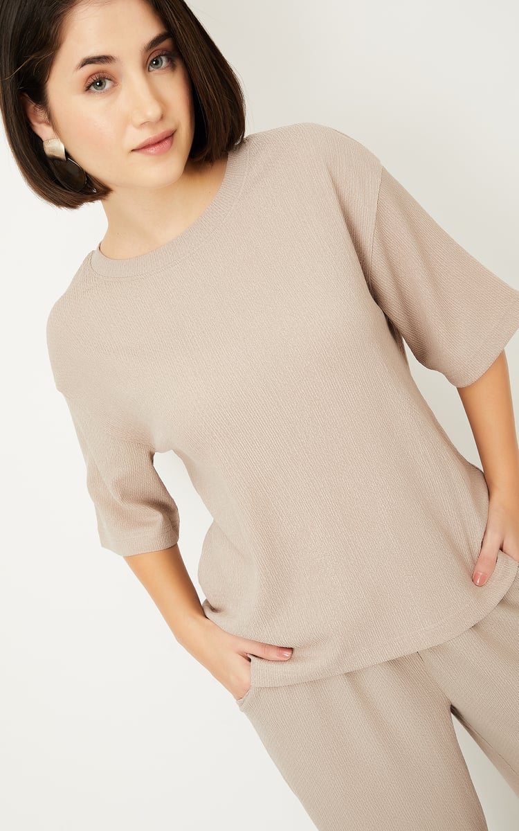 Buy Women Textured T-shirt Online at just Rs. 399.0