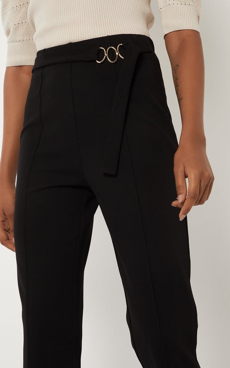 Buy Women Solid Flared Crop Trousers Online at just Rs. 999.0