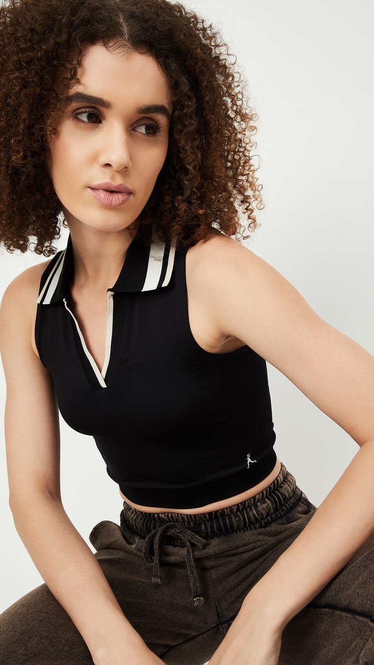 Buy Women Solid Collared Crop Top Online at just Rs. 599.0