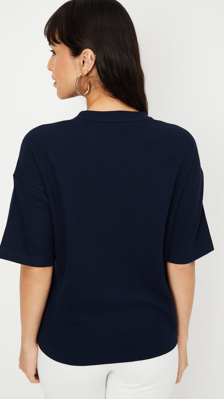 Buy Women Textured T-shirt Online at just Rs. 399.0