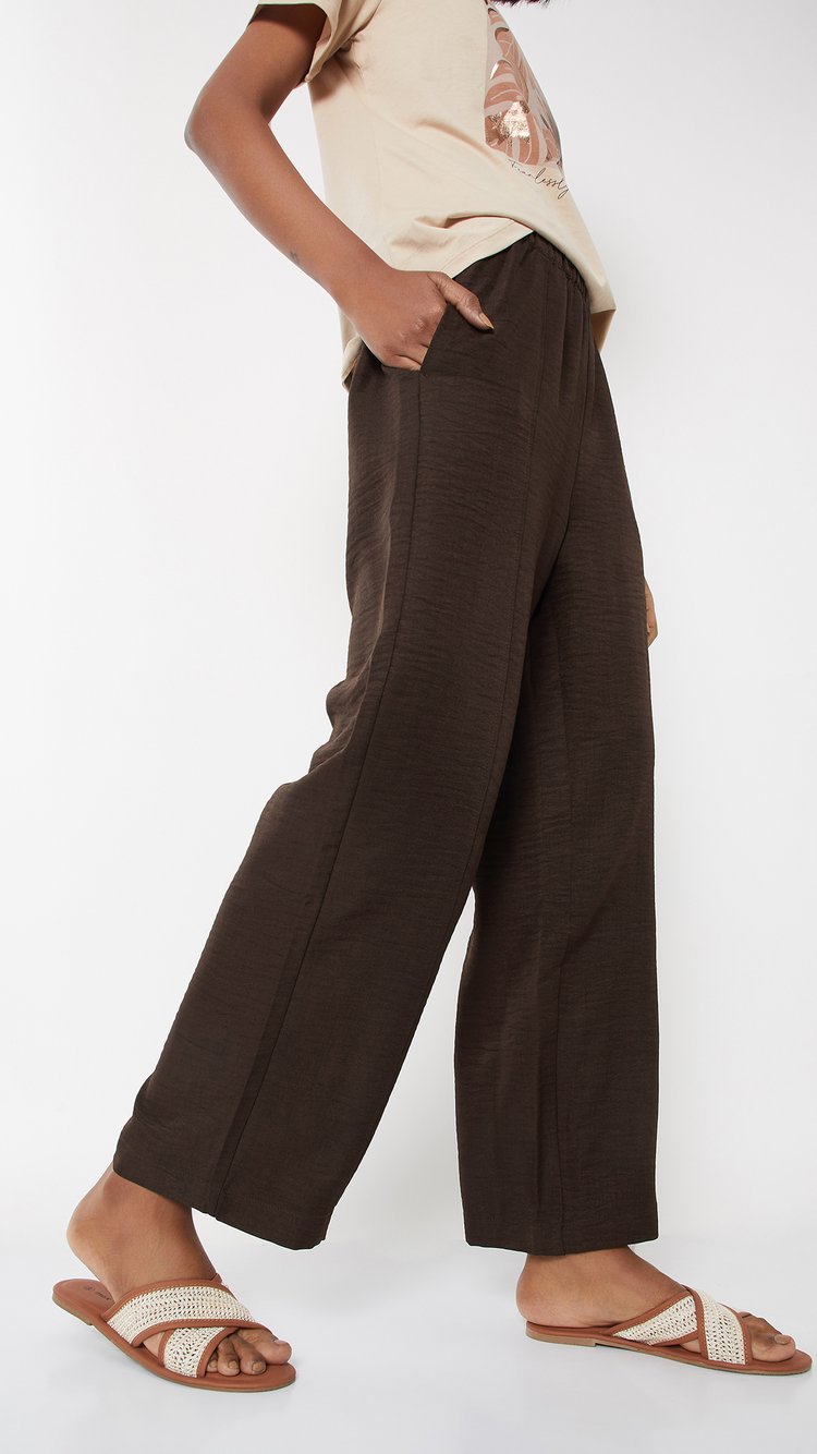 Buy Women Textured Trousers Online at just Rs. 999.0