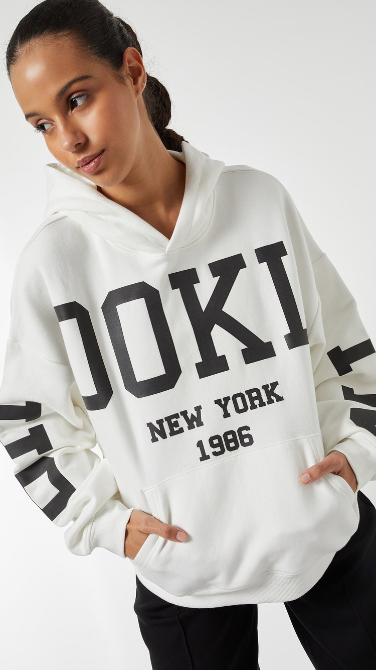 Buy Women Printed Oversized Sports Sweatshirt Online at just Rs