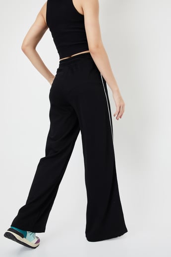Buy Women Side Striped Wide-Leg Track Pants Online at just Rs