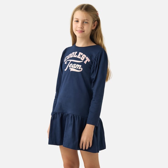 Juniors Typographic Print Drop Waist Dress with Long Sleeves