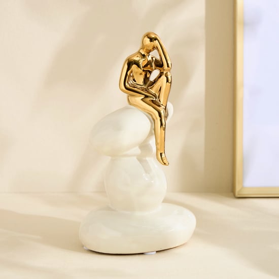 Brighton Amias Ceramic Human Sitting on Rock Figurine