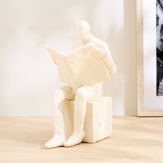 Grain Buff Polyresin Man Reading Newspaper Figurine