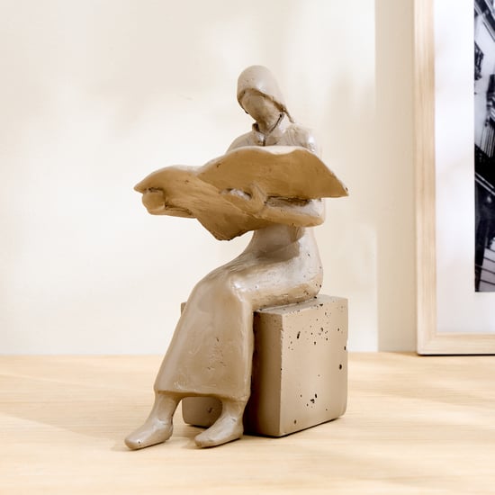 Grain Buff Polyresin Woman Reading Newspaper Figurine