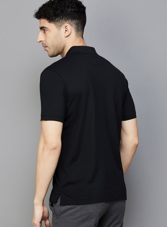 VAN HEUSEN Solid Regular Fit Polo T-shirt
