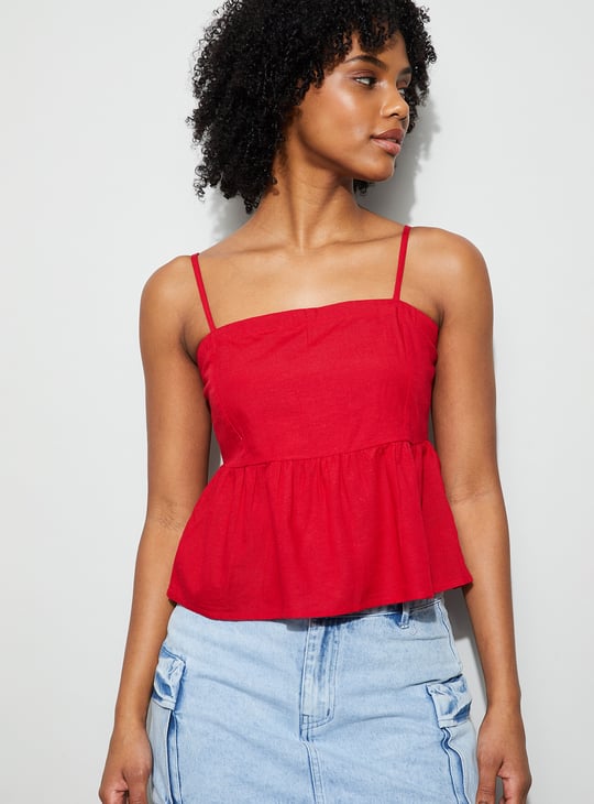 Buy GINGER Solid Tie-Up Peplum Top from Ginger at just INR 799.0
