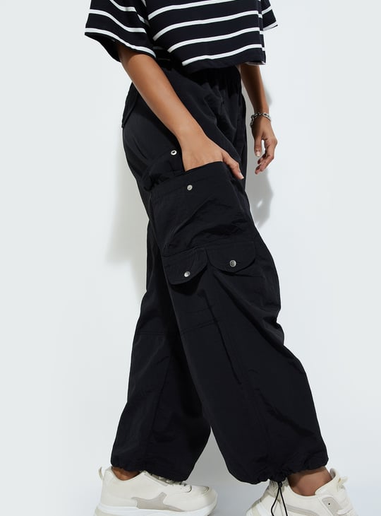 URB_N Women Solid Cargo Parachute Pants Black Solid
