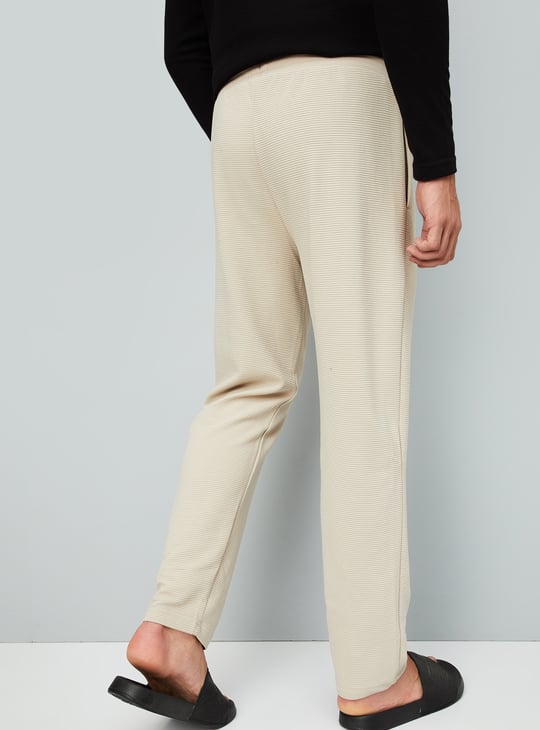 Buy Men Textured Lounge Pants Online at just Rs. 799.0