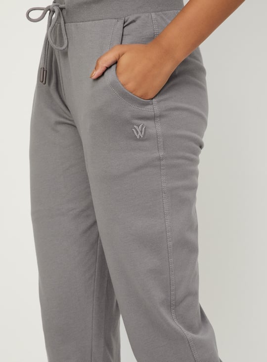 Buy Women Solid Sports Track Pants Online at just